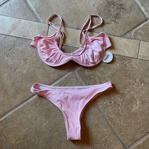 Adorable underwire bikini with high-cut bottoms from Haute Swimwear. Size M/L